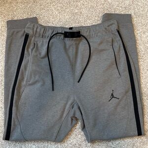 Jordan Men's Gray Jumpman Tech Jogger Pants with Black Trim